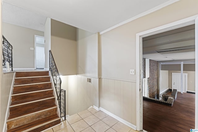540 Harlem Ave, Hueytown, AL 35023 - stairway featuring wainscoting and tile patterned floors