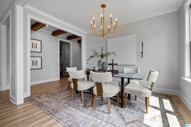 200 Simms Lndg, Pelham, AL 35124 - dining space with a chandelier, light wood finished floors, and crown molding