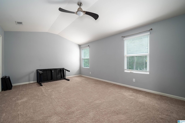 4490 Brookshire Cir, Bessemer, AL 35022 - unfurnished room featuring a ceiling fan, vaulted ceiling, and carpet