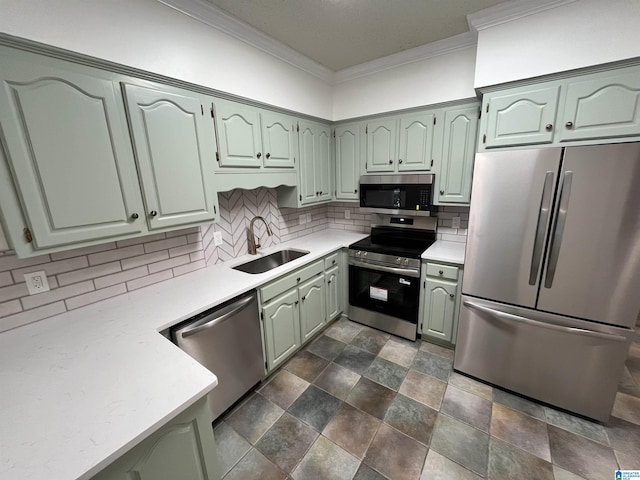 3041 Old Stone Dr, Birmingham, AL 35242 - kitchen featuring stainless steel appliances, ornamental molding, tasteful backsplash, light countertops, and dark stone finish floors