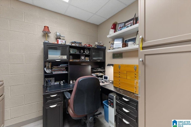 315 Roundabout Dr, Trussville, AL 35173 - office area featuring concrete block wall, built in desk, and a drop ceiling