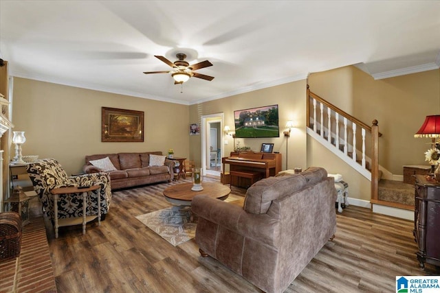315 Roundabout Dr, Trussville, AL 35173 - living area featuring a ceiling fan, wood finished floors, stairs, and ornamental molding