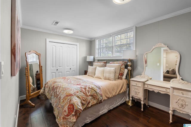 2440 Regent Ln, Hoover, AL 35226 - bedroom featuring a closet, dark wood-style floors, and crown molding