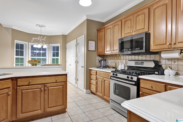 22489 Iron Masters Loop, Mccalla, AL 35111 - kitchen featuring appliances with stainless steel finishes, backsplash, light tile patterned floors, a chandelier, and light countertops