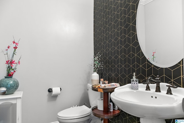3037 Twelve Stones Rd SE, Owens Cross Roads, AL 35763 - half bathroom with a sink and backsplash