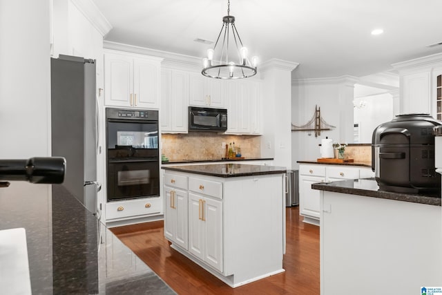 3037 Twelve Stones Rd SE, Owens Cross Roads, AL 35763 - kitchen with black appliances, a chandelier, white cabinets, dark wood-style flooring, and ornamental molding