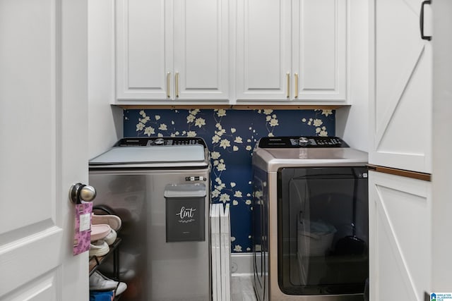 3037 Twelve Stones Rd SE, Owens Cross Roads, AL 35763 - washroom featuring separate washer and dryer, wallpapered walls, and cabinet space