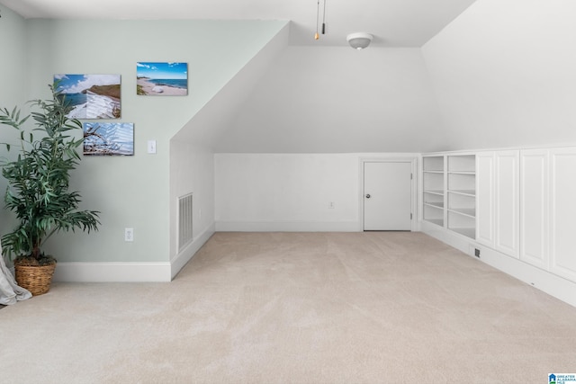 3037 Twelve Stones Rd SE, Owens Cross Roads, AL 35763 - bonus room featuring light carpet and vaulted ceiling