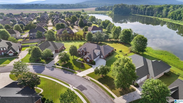 3037 Twelve Stones Rd SE, Owens Cross Roads, AL 35763 - aerial view of residential area with a nearby body of water