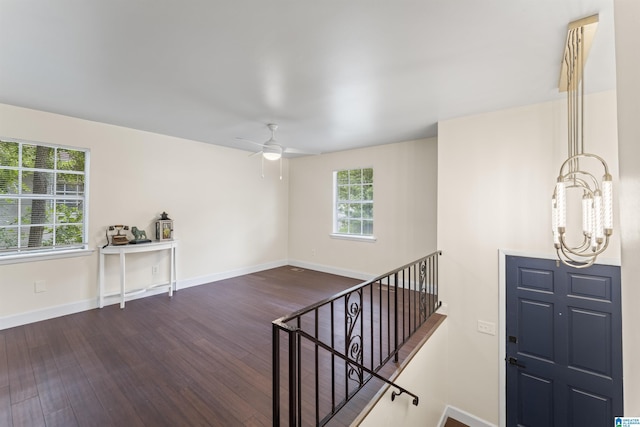 2649 6th St NE, Center Point, AL 35215 - entrance foyer with wood finished floors, a chandelier, and ceiling fan