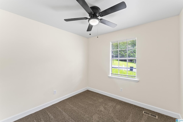 2649 6th St NE, Center Point, AL 35215 - spare room featuring dark carpet and ceiling fan