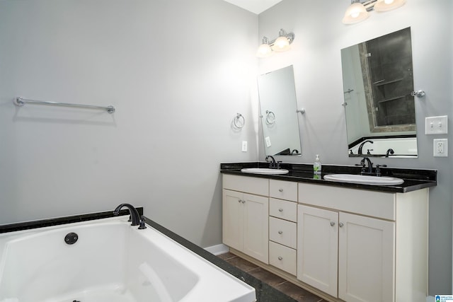 5181 Cruise St, Trussville, AL 35173 - bathroom featuring a bath and double vanity