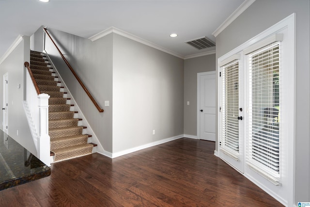 5181 Cruise St, Trussville, AL 35173 - entryway featuring dark wood-type flooring, ornamental molding, stairs, and recessed lighting