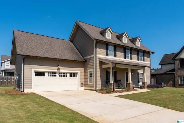 5181 Cruise St, Trussville, AL 35173 - view of front of home with covered porch, a garage, concrete driveway, a front yard, and roof with shingles