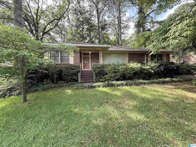 532 Zinnia Ln, Birmingham, AL 35215 - view of front of home featuring brick siding and a front lawn