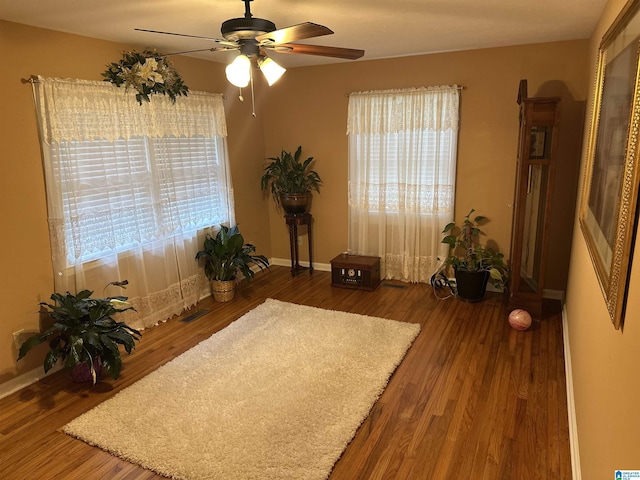 1988 County Rd, Alexander City, AL 35010 - sitting room featuring a ceiling fan, plenty of natural light, and wood finished floors