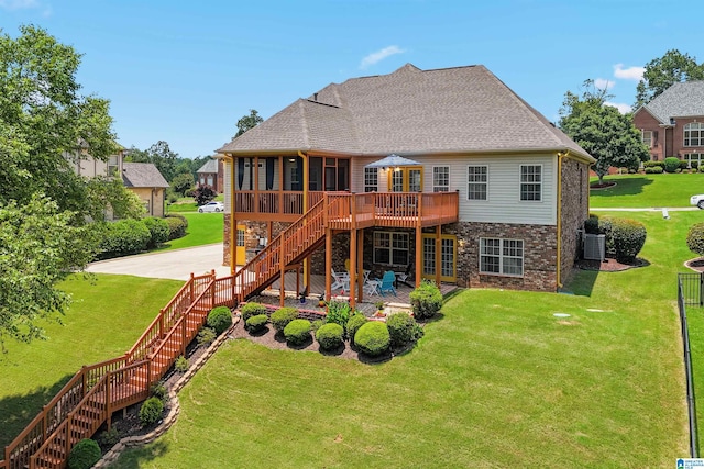 2816 Aster Lake Rd, Helena, AL 35022 - rear view of property featuring stairs, a wooden deck, a patio area, a yard, and a sunroom