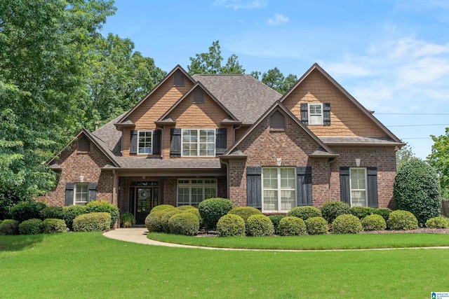 163 River Valley Rd, Helena, AL 35080 - craftsman-style house with a front lawn, brick siding, and roof with shingles
