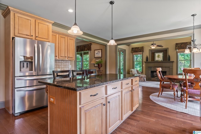 163 River Valley Rd, Helena, AL 35080 - kitchen featuring stainless steel fridge with ice dispenser, dark wood-style flooring, a fireplace, light brown cabinets, and a kitchen island