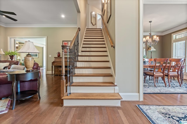 163 River Valley Rd, Helena, AL 35080 - stairs featuring ceiling fan, crown molding, wood finished floors, a chandelier, and recessed lighting