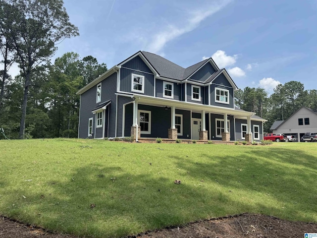 21320 Callie Cir, Mccalla, AL 35111 - view of front of property featuring a porch, a front lawn, and board and batten siding