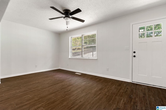 4533 Oak Dr, Pinson, AL 35126 - entryway with dark wood-style floors, healthy amount of natural light, ceiling fan, and a textured ceiling