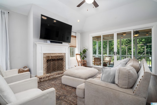 4945 Natalie Way, Trussville, AL 35173 - living area with ceiling fan, a brick fireplace, and wood finished floors