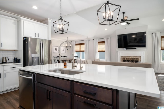 4945 Natalie Way, Trussville, AL 35173 - kitchen with a chandelier, stainless steel fridge with ice dispenser, open floor plan, light countertops, and recessed lighting