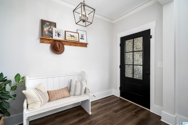 4945 Natalie Way, Trussville, AL 35173 - entryway with dark wood finished floors, a chandelier, and ornamental molding