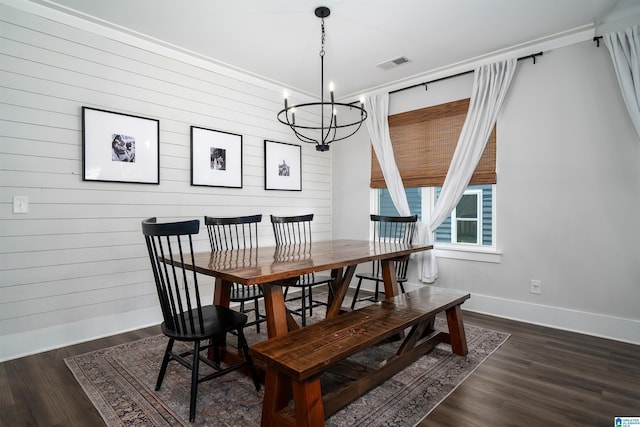 4945 Natalie Way, Trussville, AL 35173 - dining area with a chandelier, wood walls, and dark wood-style floors