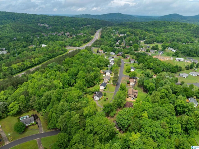 116 Twin Lakes Rd, Trussville, AL 35173 - drone / aerial view of a heavily wooded area and a mountainous background