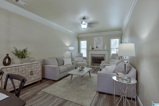 1186 Inverness Cove Way, Hoover, AL 35242 - living room with a ceiling fan, ornamental molding, wood finished floors, and a tile fireplace