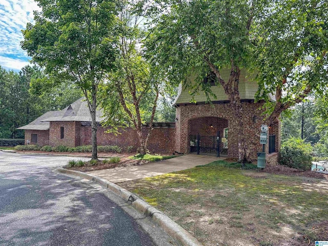 1186 Inverness Cove Way, Hoover, AL 35242 - english style home featuring brick siding