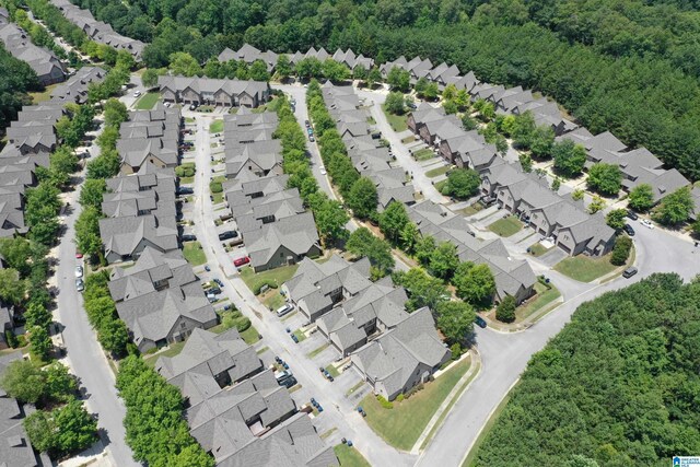 1186 Inverness Cove Way, Hoover, AL 35242 - aerial perspective of suburban area with a heavily wooded area