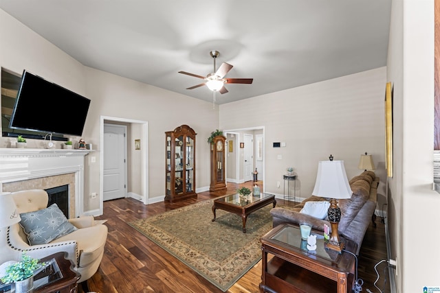 417 Rock View Trl, Maylene, AL 35114 - living room featuring a ceiling fan, dark wood finished floors, and a fireplace