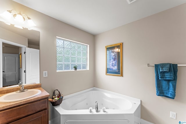 417 Rock View Trl, Maylene, AL 35114 - full bath featuring a tub with jets and vanity