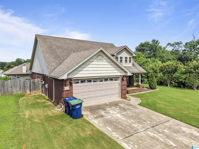 417 Rock View Trl, Maylene, AL 35114 - view of front of home with driveway, an attached garage, brick siding, and a shingled roof