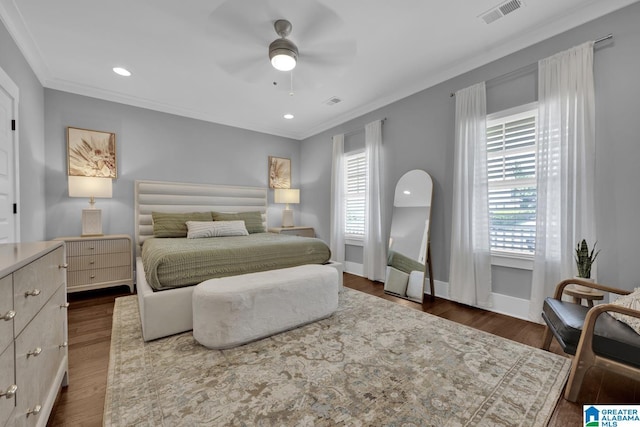 7808 Jayden Dr, Trussville, AL 35173 - bedroom with multiple windows, dark wood finished floors, ornamental molding, ceiling fan, and recessed lighting