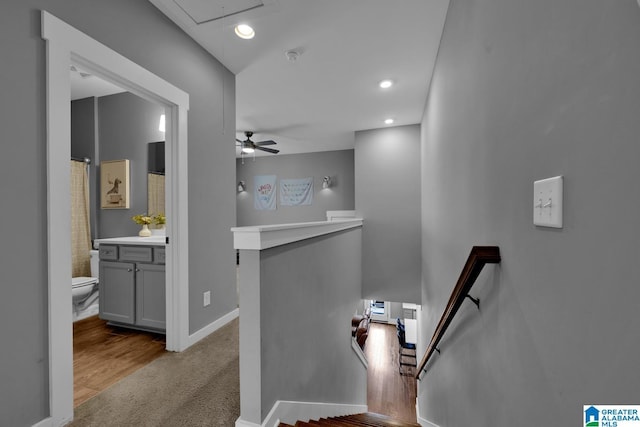 7808 Jayden Dr, Trussville, AL 35173 - staircase with attic access, wood finished floors, a ceiling fan, recessed lighting, and a baseboard radiator