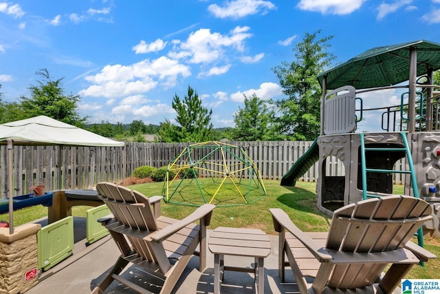 7808 Jayden Dr, Trussville, AL 35173 - fenced backyard with a playground and a patio