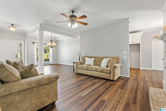3168 Cahaba Park Dr, Trussville, AL 35173 - living area with ceiling fan, dark wood-style flooring, a chandelier, and crown molding