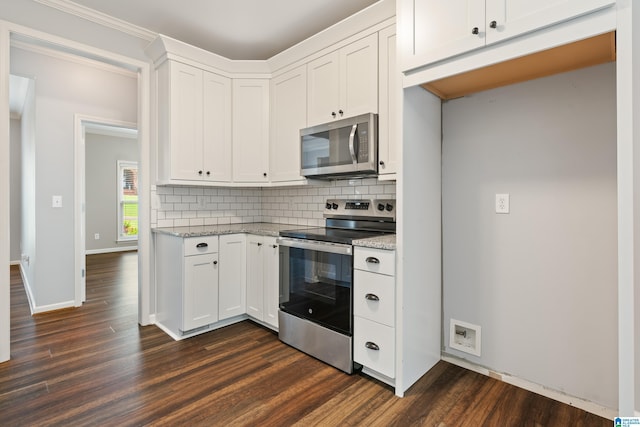 3168 Cahaba Park Dr, Trussville, AL 35173 - kitchen featuring stainless steel appliances, dark wood finished floors, backsplash, light stone countertops, and ornamental molding