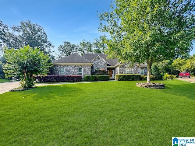 4205 Waterford Ln, Trussville, AL 35173 - view of front of property featuring stone siding and a front lawn