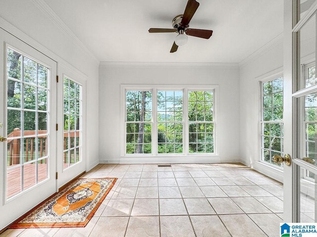 4205 Waterford Ln, Trussville, AL 35173 - unfurnished sunroom with tile patterned floors, crown molding, and french doors