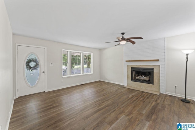 6256 Alabama Dr, Trussville, AL 35173 - unfurnished living room featuring a ceiling fan, wood finished floors, and a fireplace