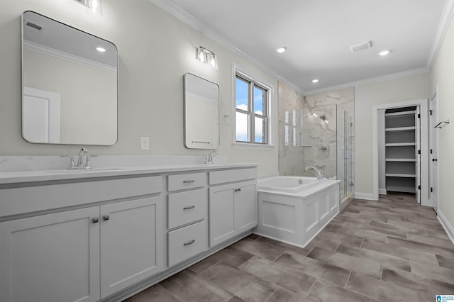 500 Simms Lndg, Pelham, AL 35124 - bathroom featuring ornamental molding, a shower stall, double vanity, a garden tub, and recessed lighting