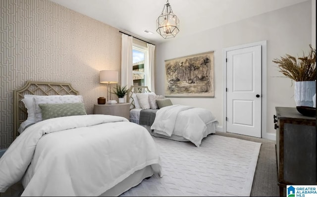 500 Simms Lndg, Pelham, AL 35124 - bedroom with carpet floors, a chandelier, and wallpapered walls