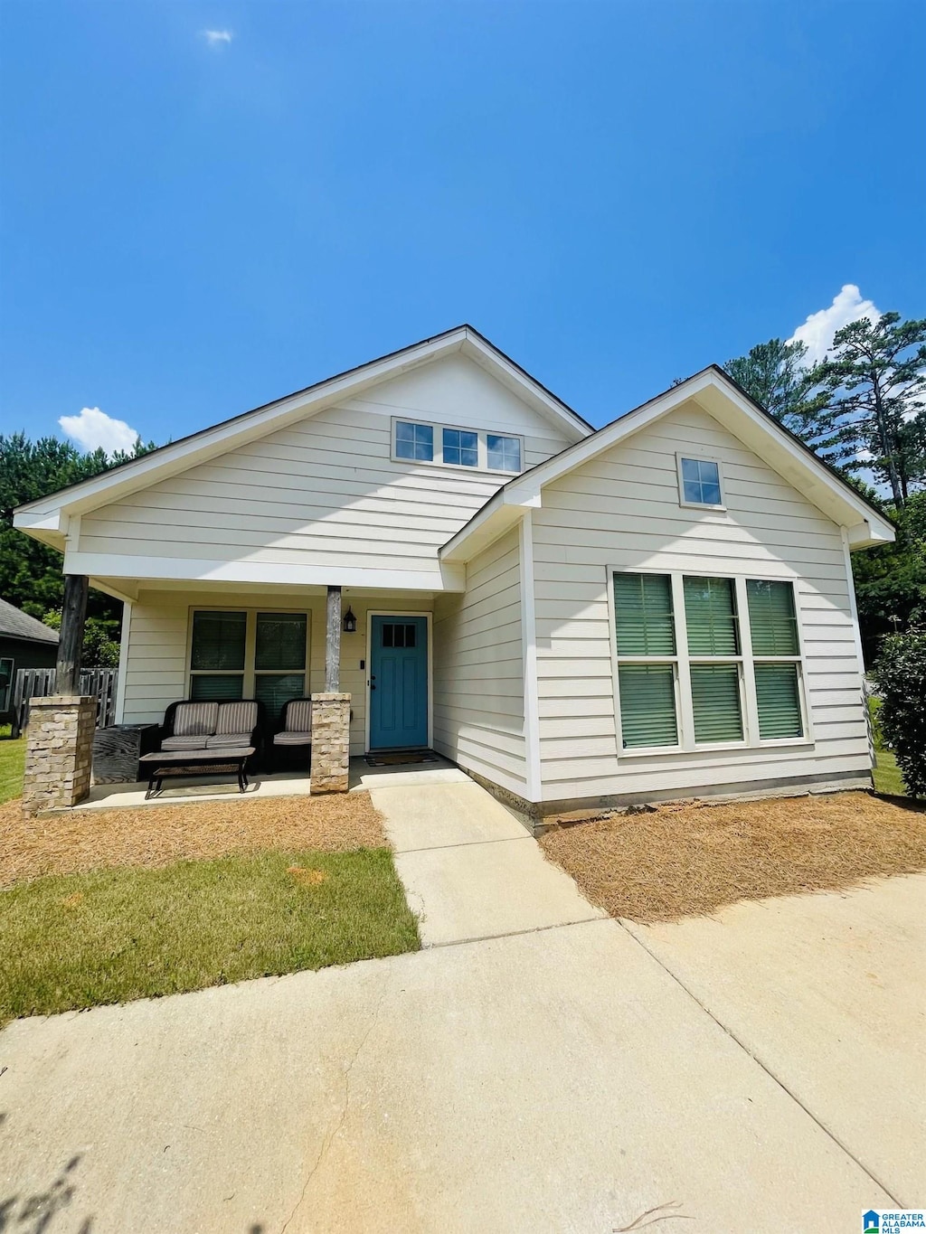 500 Briar Ridge Cir, Odenville, AL 35120 - view of front of house featuring a porch, outdoor lounge area, and a front yard