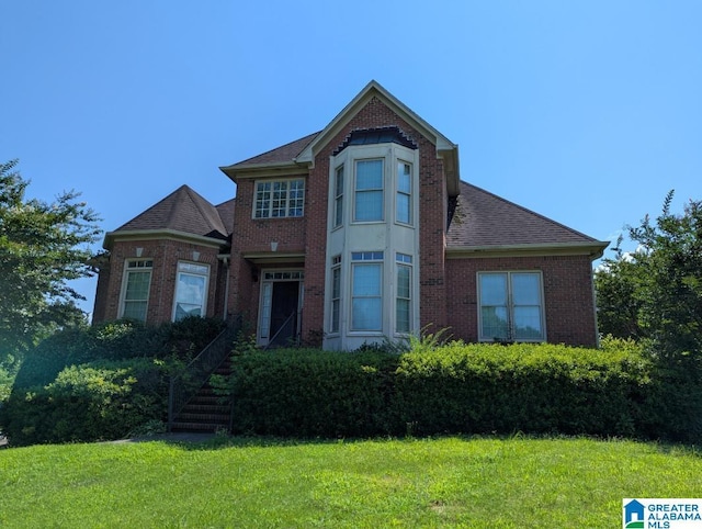 100 Emily Cir, Birmingham, AL 35242 - view of front facade with a front lawn, brick siding, and roof with shingles