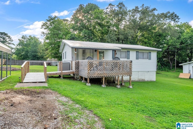 5628 Boling Rd, Mount Olive, AL 35117 - view of front of property with a metal roof, a wooden deck, and view of scattered trees